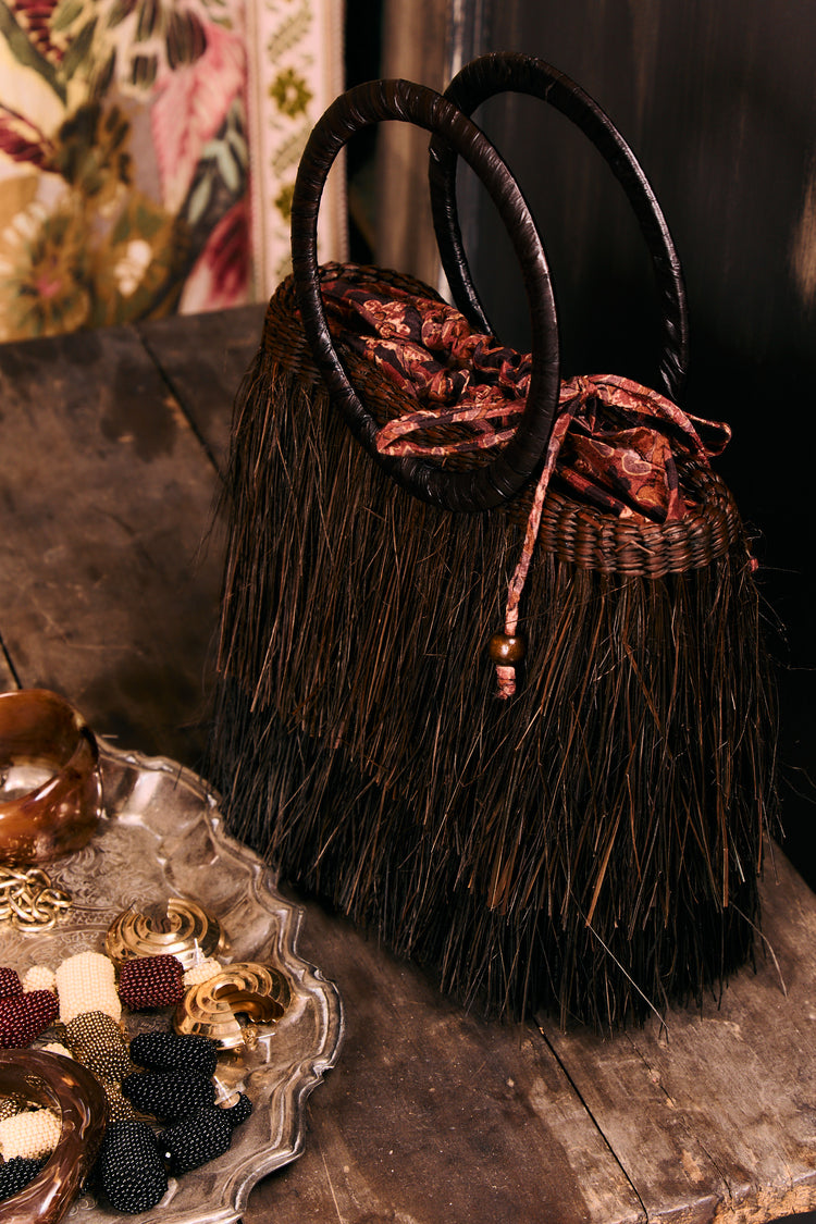 
                  
                    Cartera paja café
                  
                