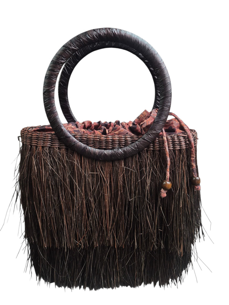 
                  
                    Cartera paja café
                  
                