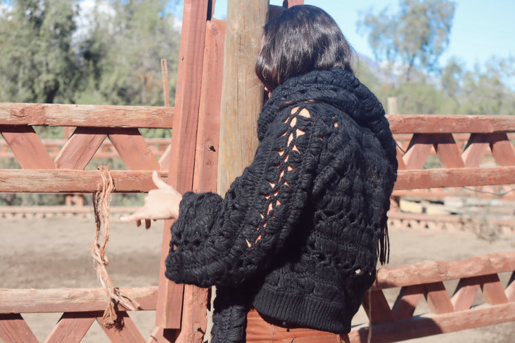 
                  
                    Cardigan Negro
                  
                