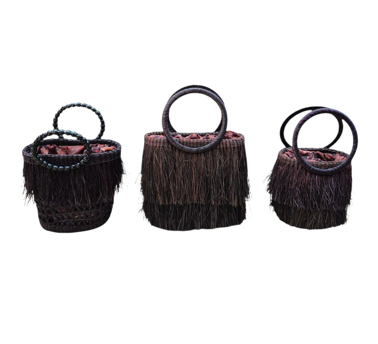 
                  
                    Cartera paja café
                  
                